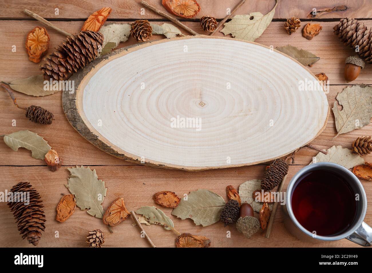 drink in a retro mug on a wooden background in the autumn style . top view with space for text Stock Photo