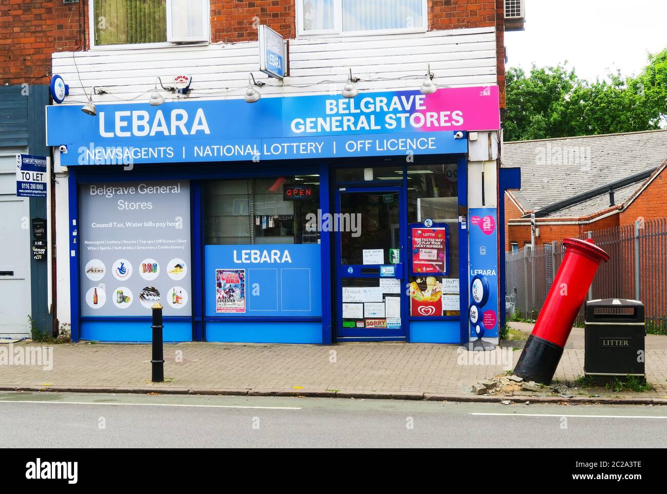 Belgrave general stores and post office, Leicester. Damaged post box by