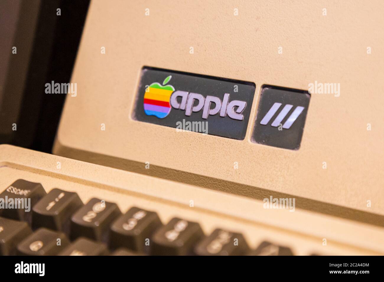 Istanbul, Turkey, March 2019: Closeup old rainbow Apple logo on old Macintosh computer. Rahmi Koc museum Stock Photo