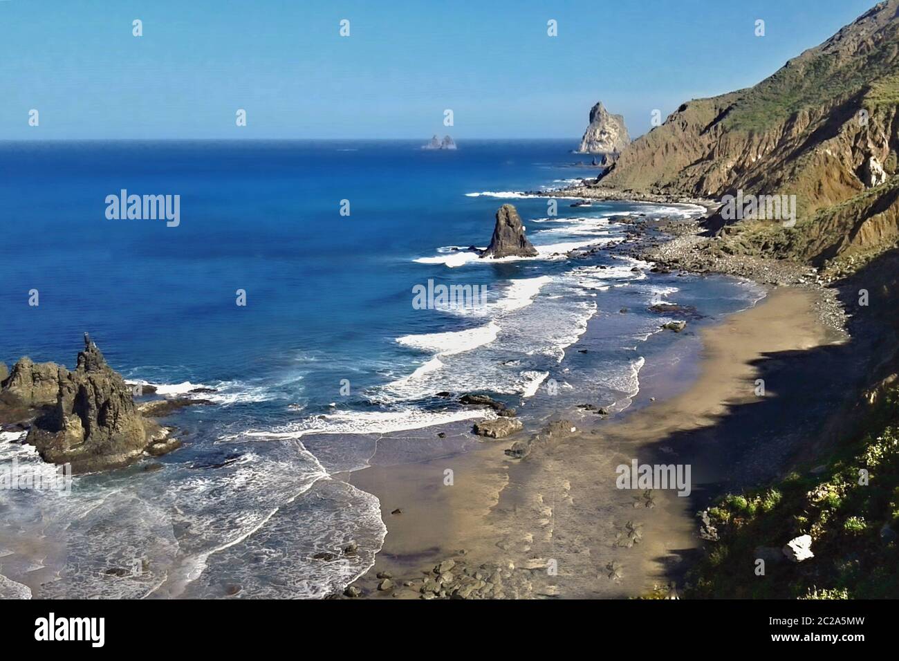 Wild and lonely beach in the romantic Anaga mountains of the Canary island of tenerife near the village of Benijo. Deep Atlantic with sharp volcanic s Stock Photo