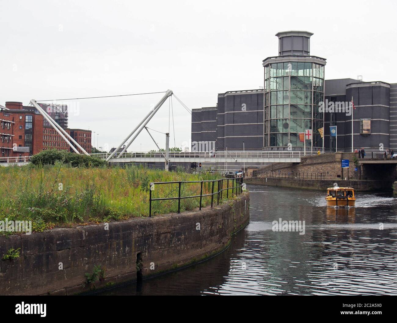 a water taxi near knights bridge crossing the river aire and canal in