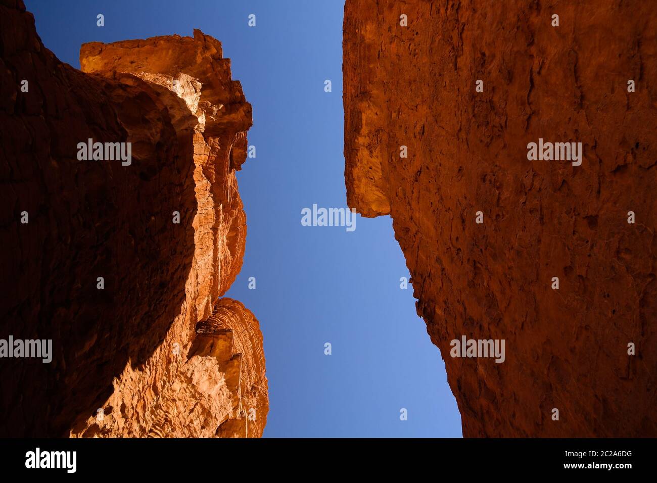 Bottom-up view to Abstract Rock formation at plateau Ennedi stone forest in Chad Stock Photo