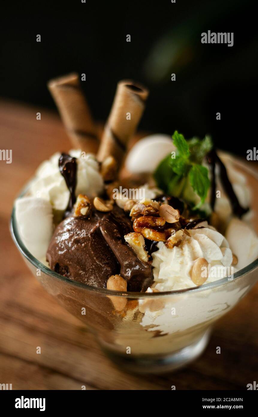 organic chocolate and mint vanilla ice cream sundae dessert in bowl ...