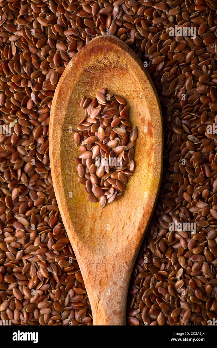 Close-Up of Flaxseed on Wooden Spoon Stock Photo