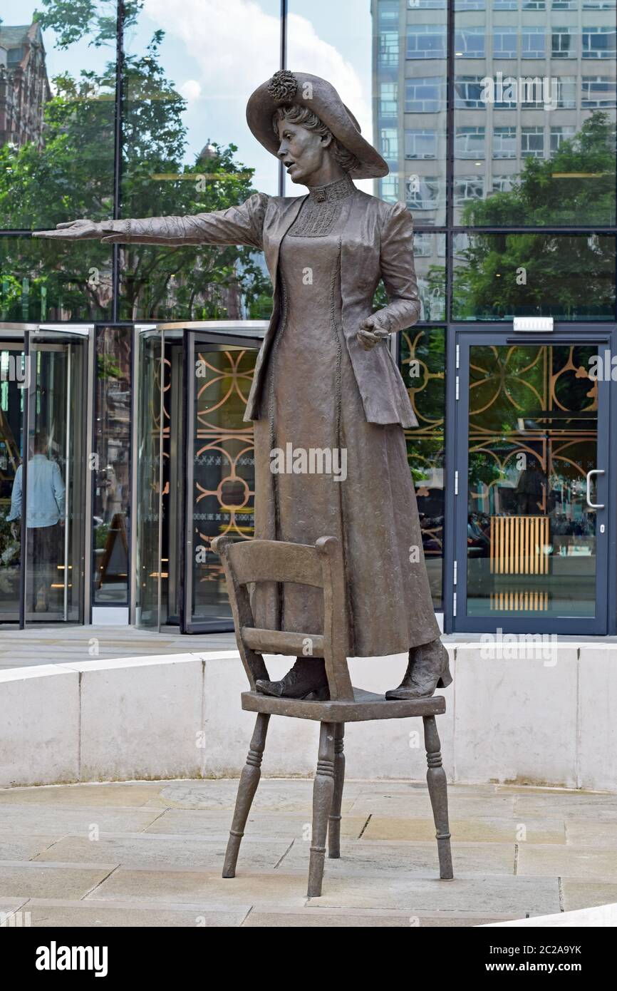 Statue of Emmeline Pankhurst stood on a chair with arm outstretched in St Peters Square Manchester UK Stock Photo