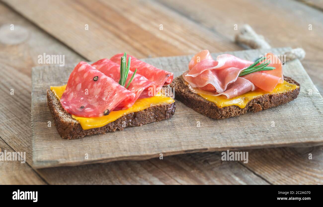 Spanish sandwiches with salchichon anb jamon close-up Stock Photo