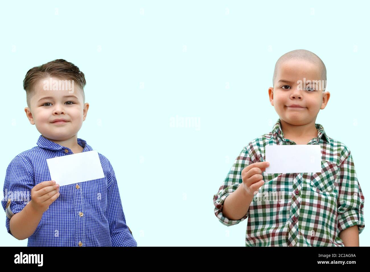 Two young boys holding hands hi-res stock photography and images - Alamy