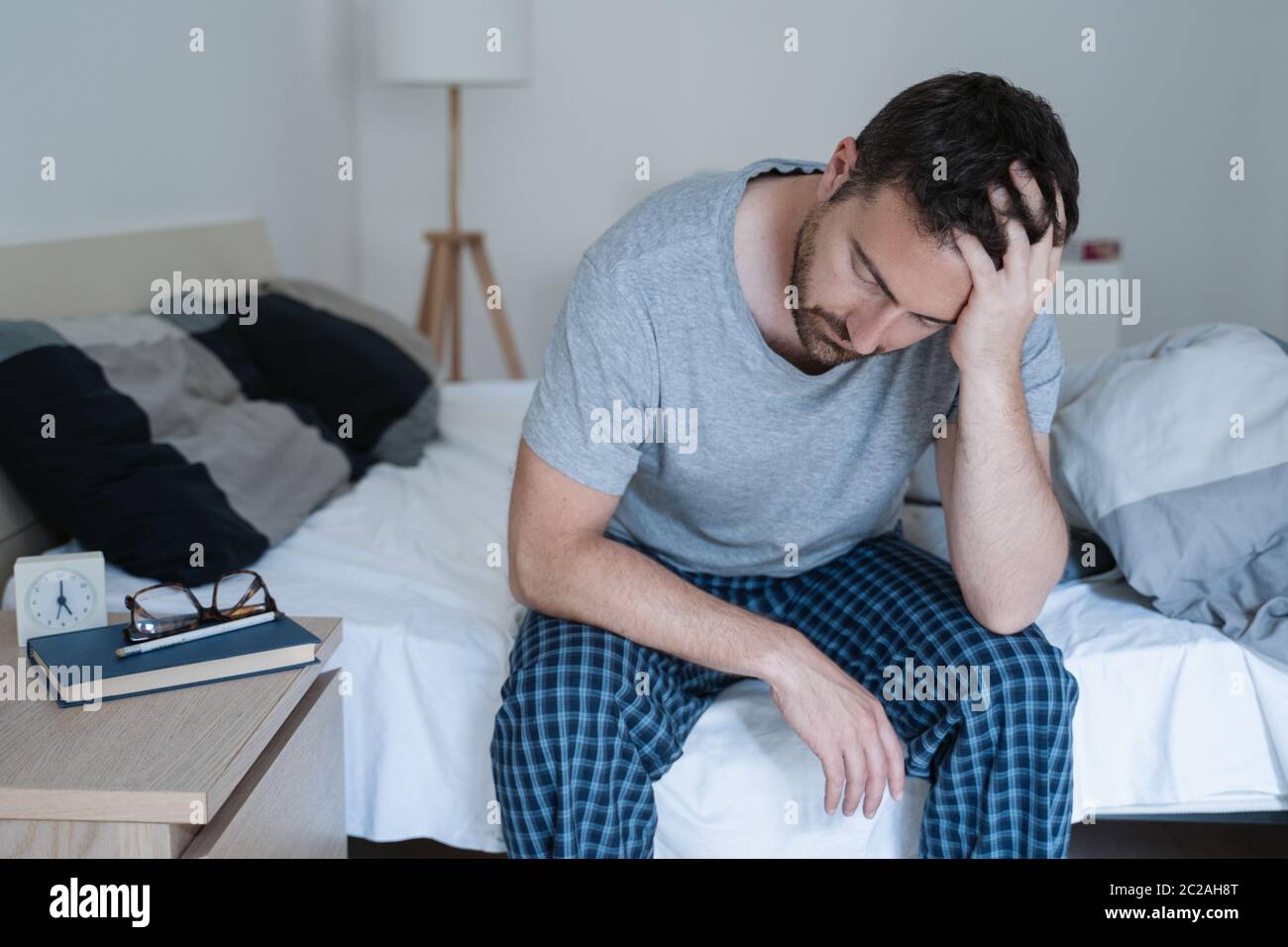 Depressed man waking up hi-res stock photography and images - Alamy