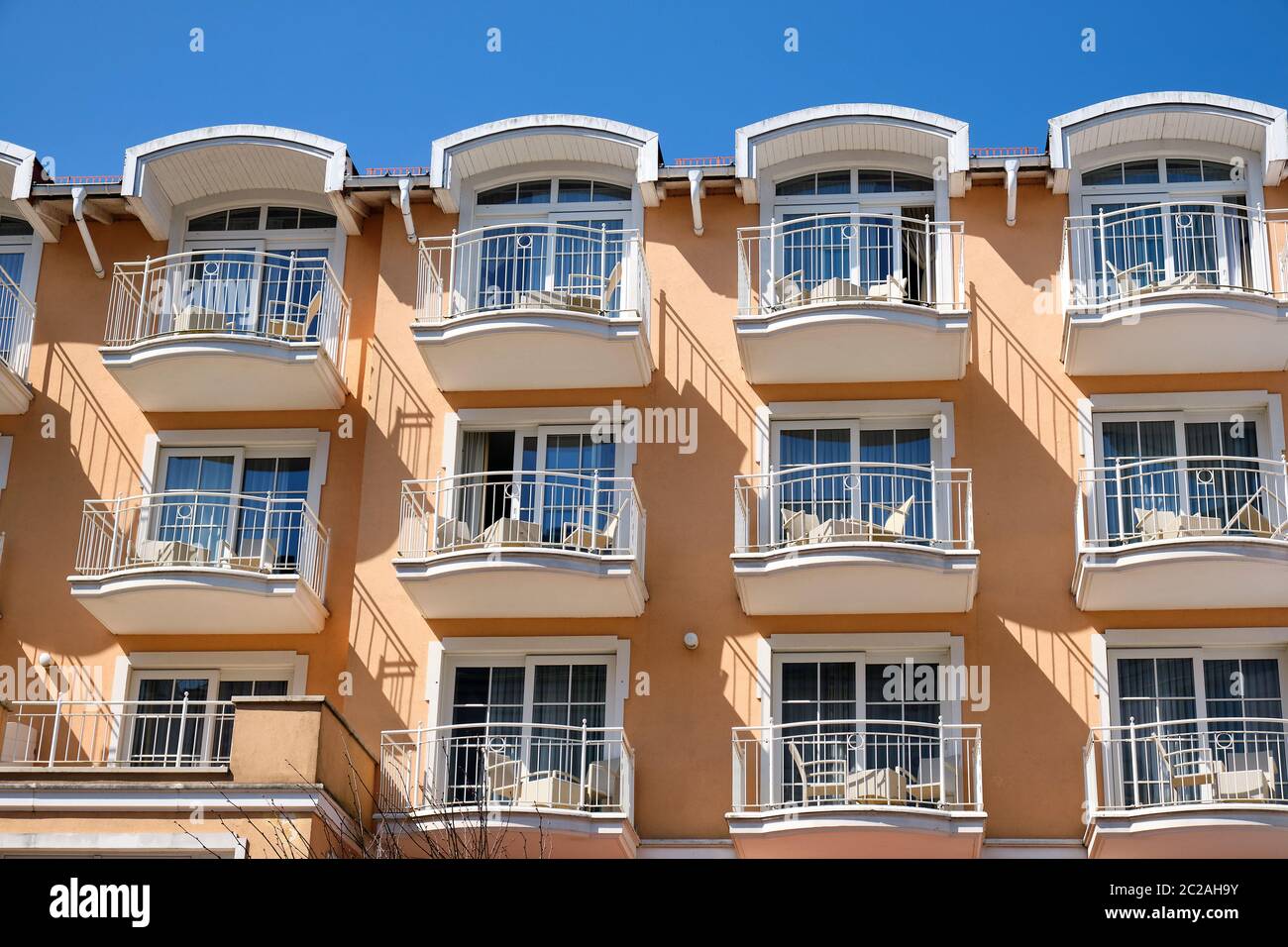 Facade of a tourist resort with a lot of balconies seen in Germany Stock Photo