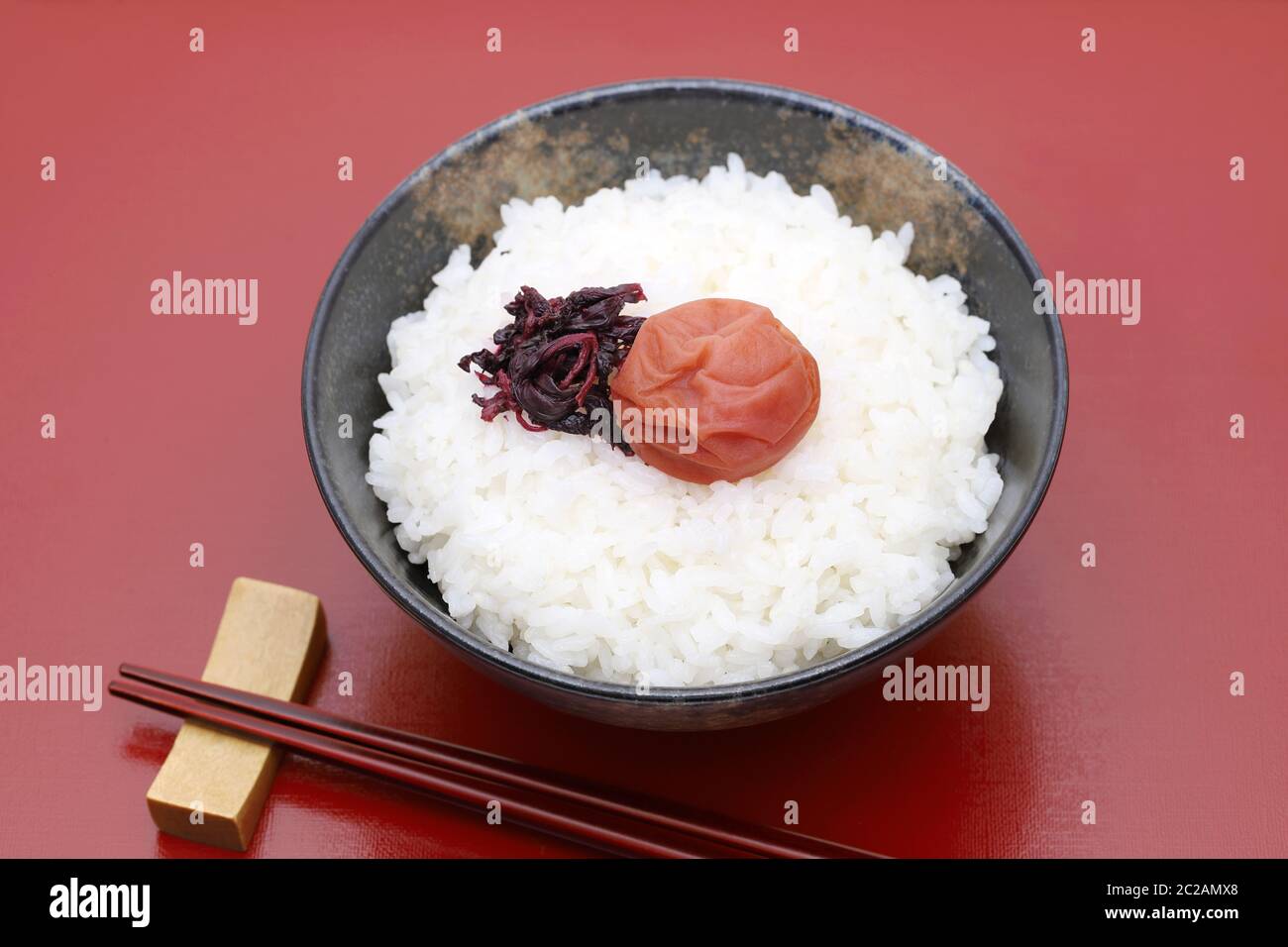 Japanese food, Umeboshi pickled salt plum on white rice Stock Photo Alamy
