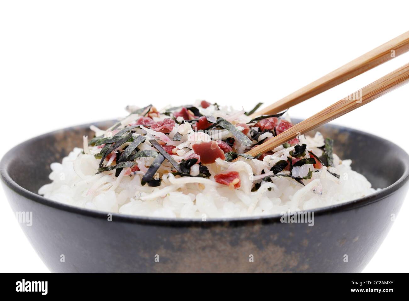 Japanese food, Shirasu and umeboshi on cooked white rice Stock Photo ...