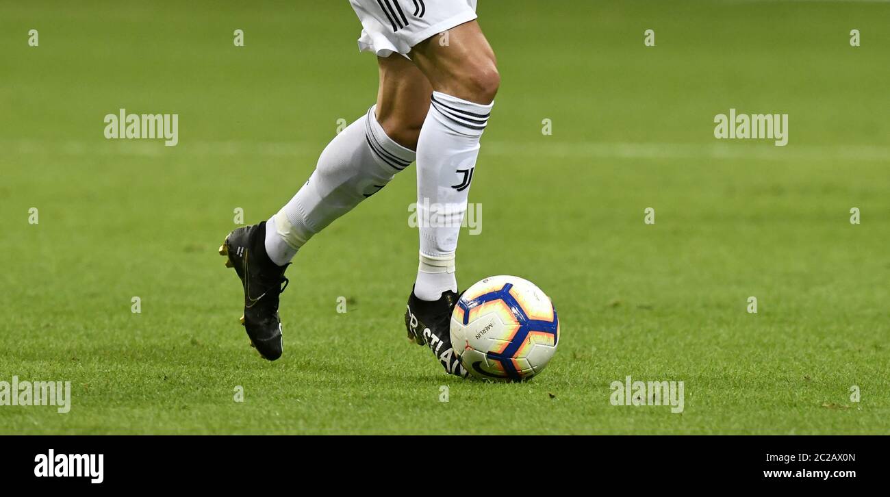 portuguese soccer's star Cristiano Ronaldo, close up legs controls the ball, with  Juventus F.C. vs Inter Milan, at the san siro soccer stadium, in Mi Stock Photo