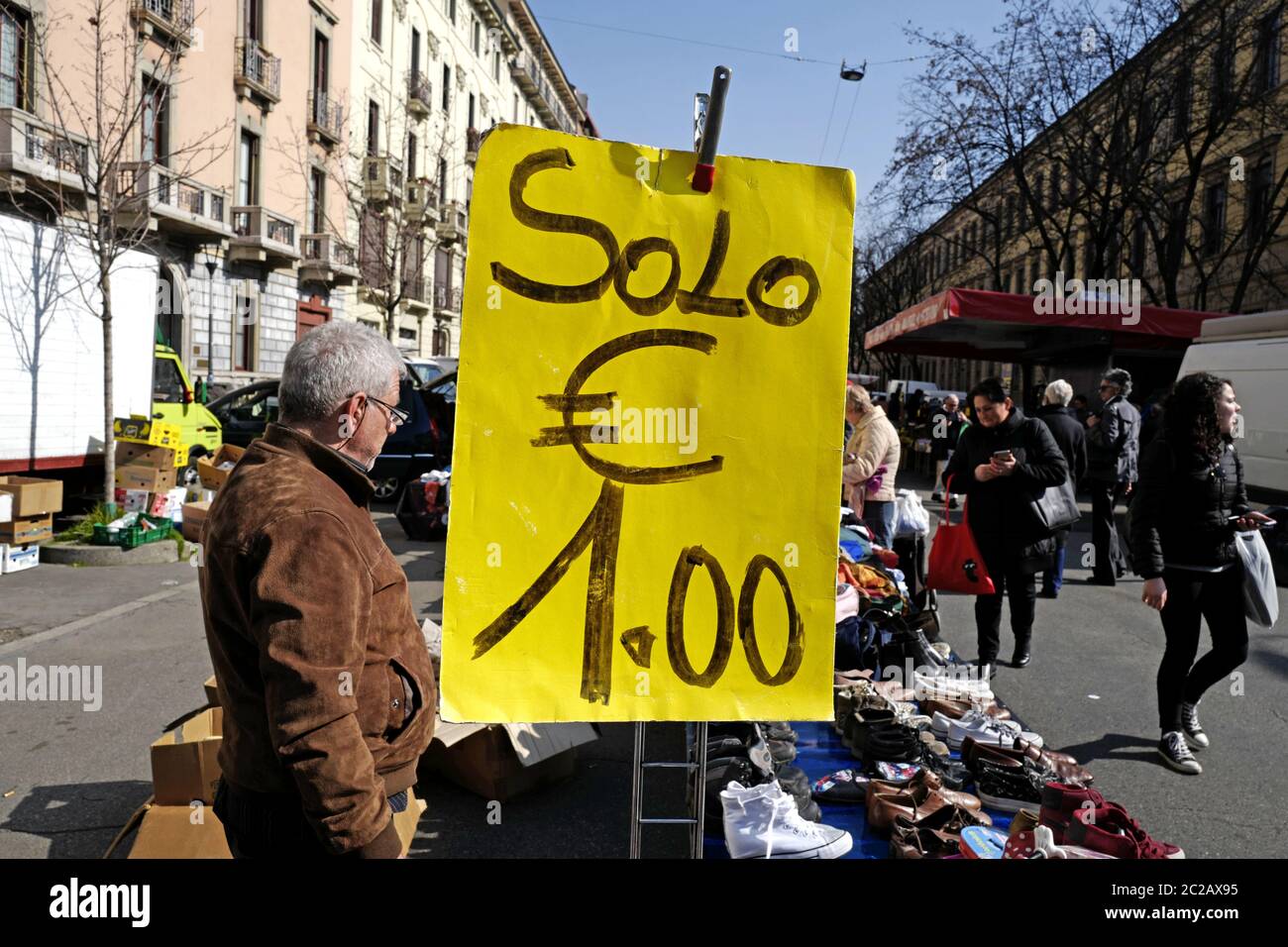 Cheap shopping at the street market, in Milan. Stock Photo