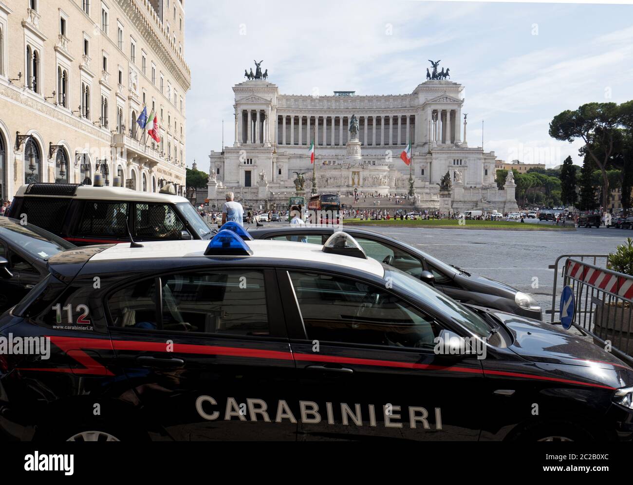 Fatherland memorial monument and Carabinieri police car, in Venice square, in Rome. Stock Photo