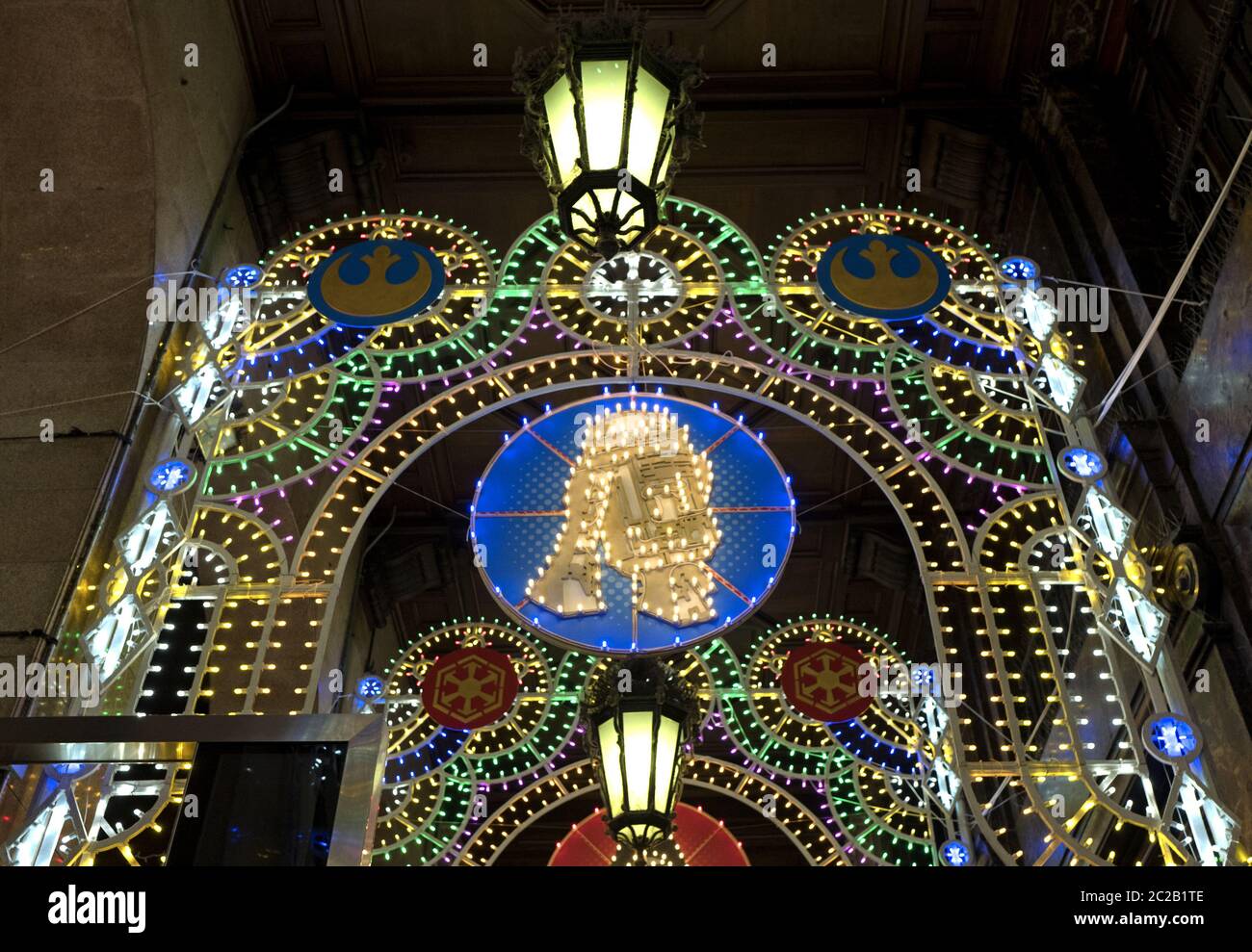 traditional Christmas lights, with Star Wars charachters, on the movie theatre gallery, in Milan, Italy. Stock Photo