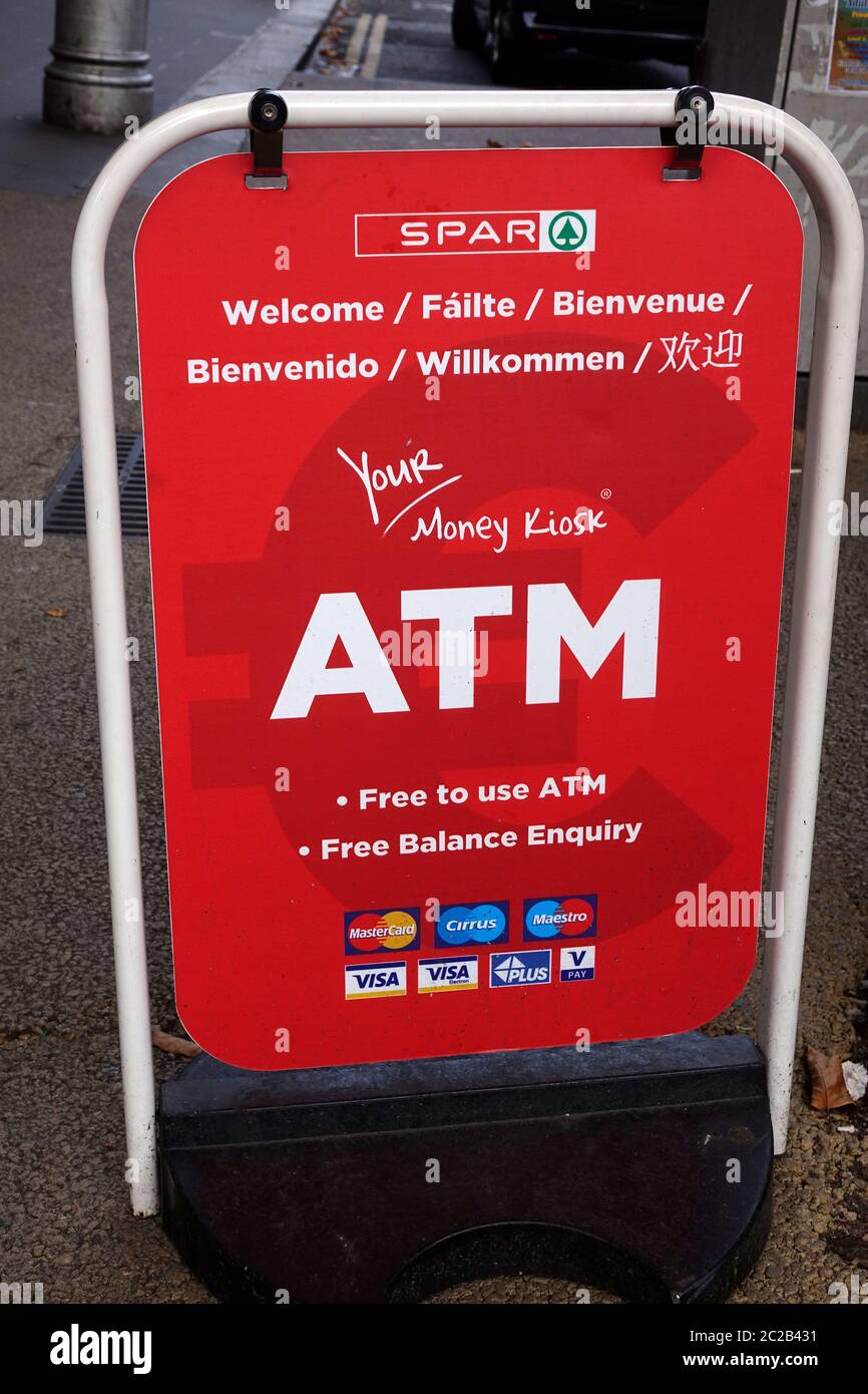 Spar Supermarket Grocery Shop Street Sign Advertising ATM Service In Dublin City Centre Ireland Stock Photo