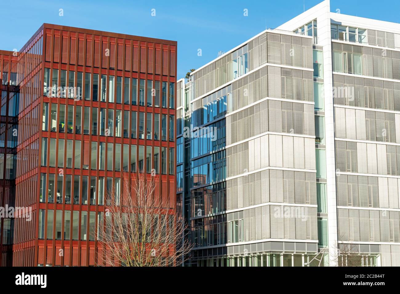 Modern red and white office buildings seen at the Hafencity in Hamburg Stock Photo