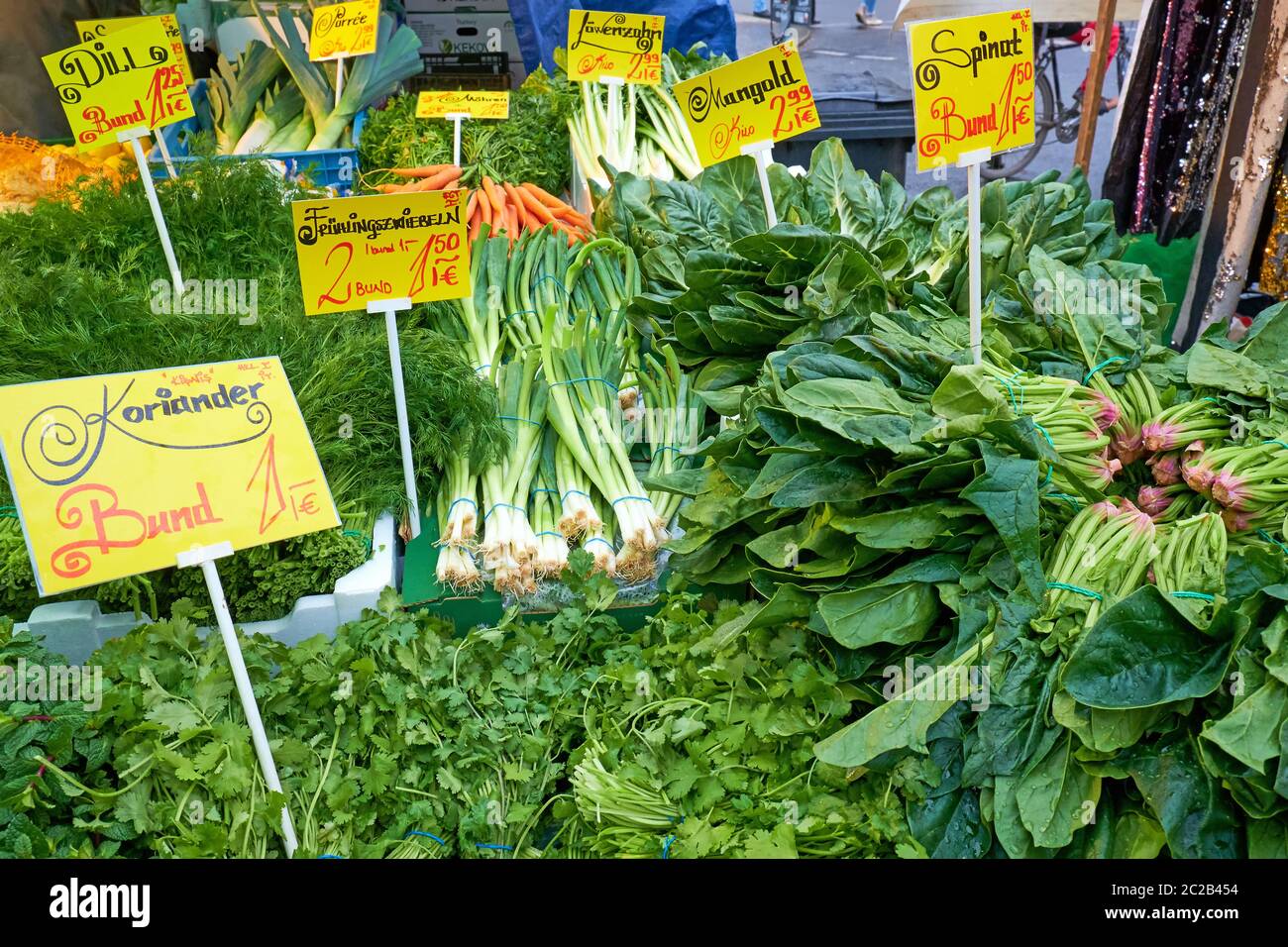 Herbs and vegetables for sale at a market Stock Photo
