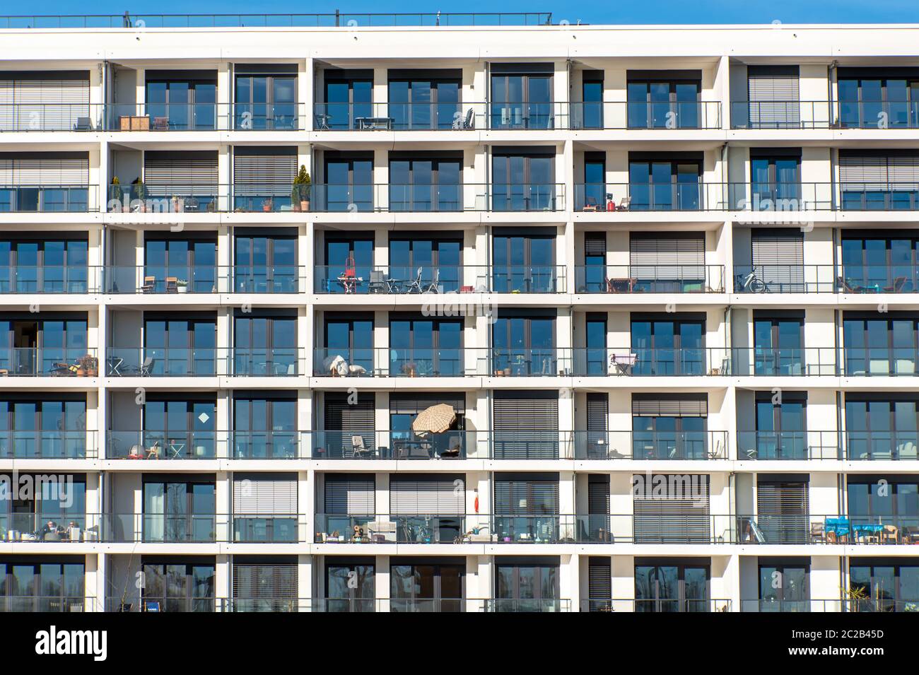 Facade of a modern apartment building with a lot of balconies seen in Hamburg, Germany Stock Photo