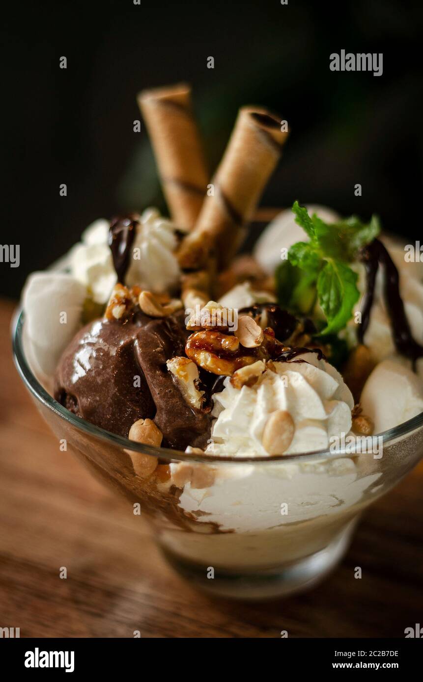 organic chocolate and mint vanilla ice cream sundae dessert in bowl ...