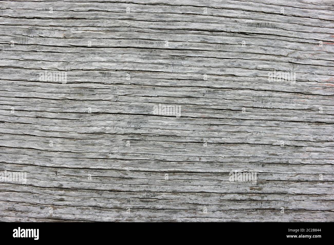 Old wooden oak house beam lime washed and dating back to tudor times which could be used as a background or texture. Stock Photo