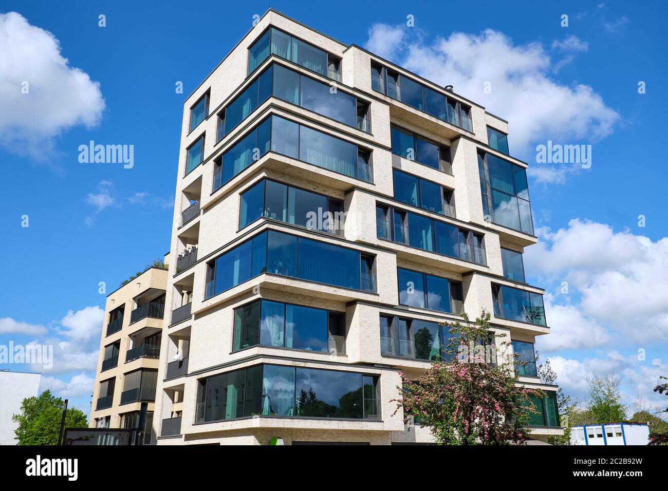 Modern multi-family house with a lof of glass seen in Berlin, Germany Stock Photo