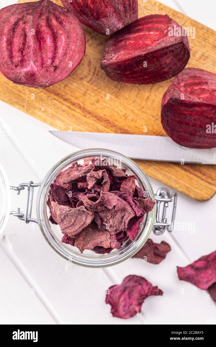 Tasty raw beetroot. Dried beetroot in jar. Top view. Stock Photo