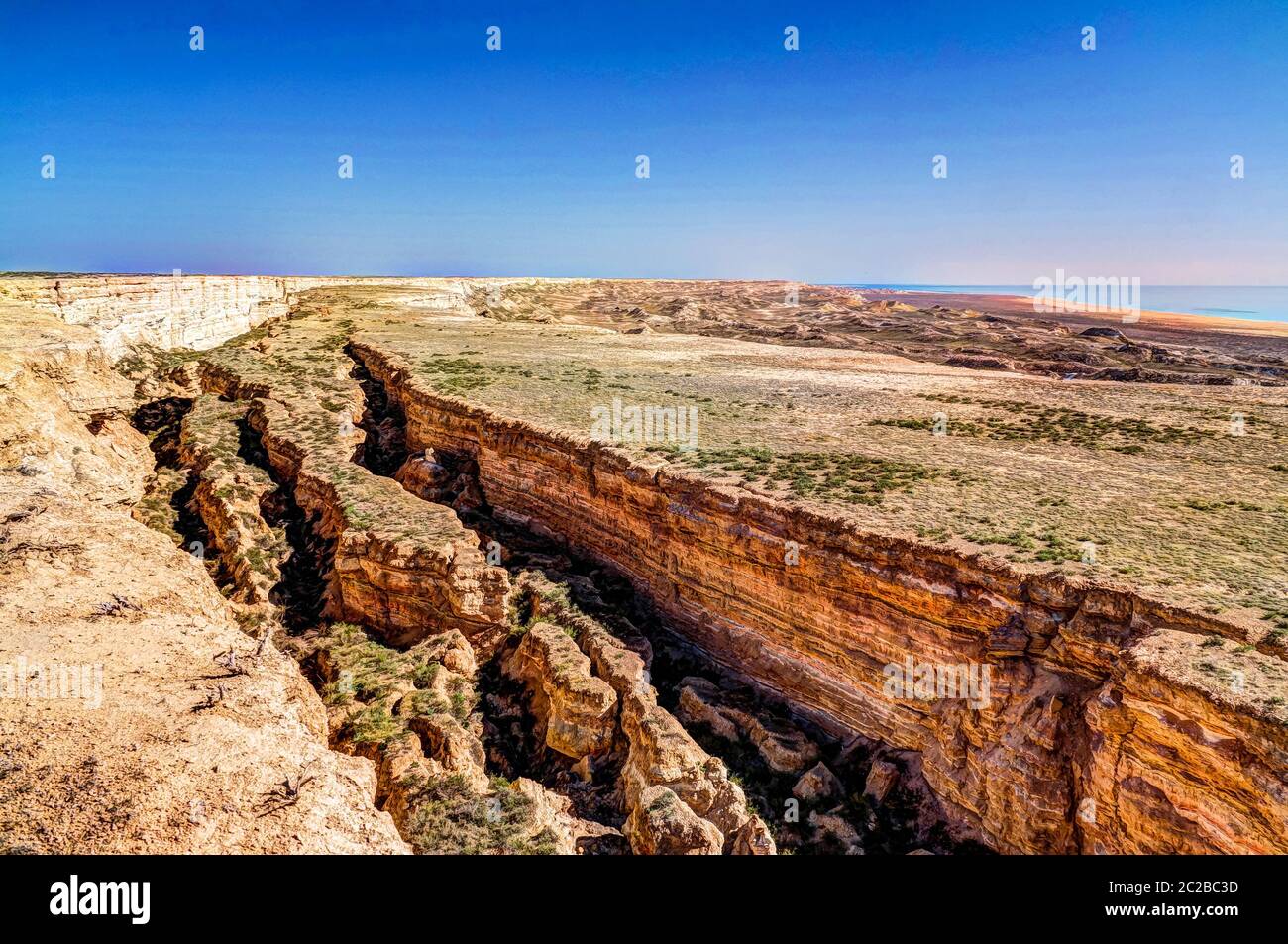 Panorama view to Aral sea from the rim of Plateau Ustyurt near Aktumsuk cape , Karakalpakstan, Uzbekistan Stock Photo