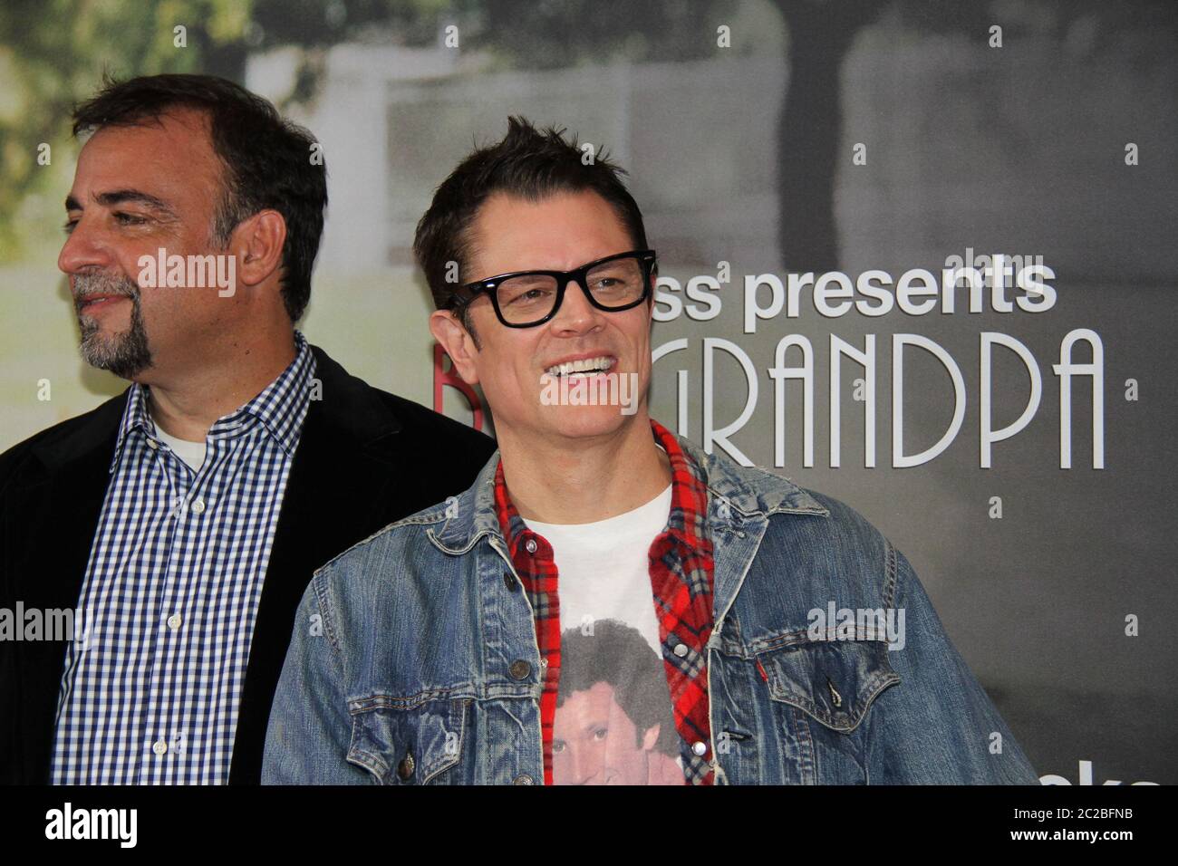 Johnny Knoxville ‘Irving Zisman’ and Producer Derek Freda arrive on the red carpet for the special screening of Jackass Presents: Bad Grandpa at Event Stock Photo