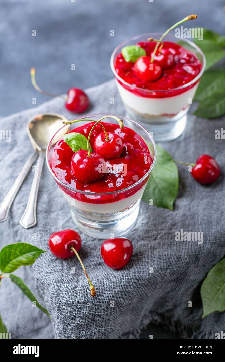 Delicious cheesecake with cherry jelly Stock Photo Alamy