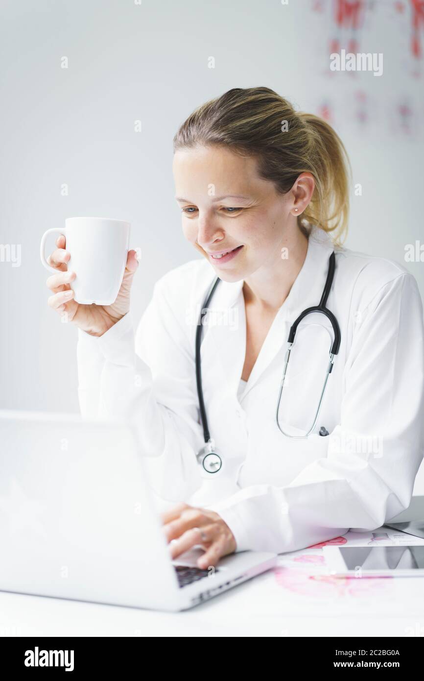 portrait of beautyful young and happy female doctor Stock Photo