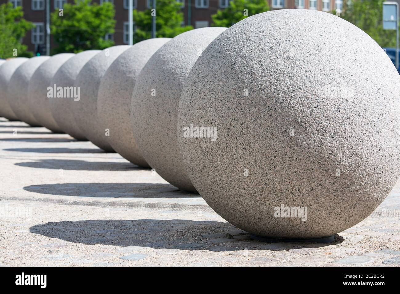 Decorative great stone spheres on the Christiansborg Palace Square ...