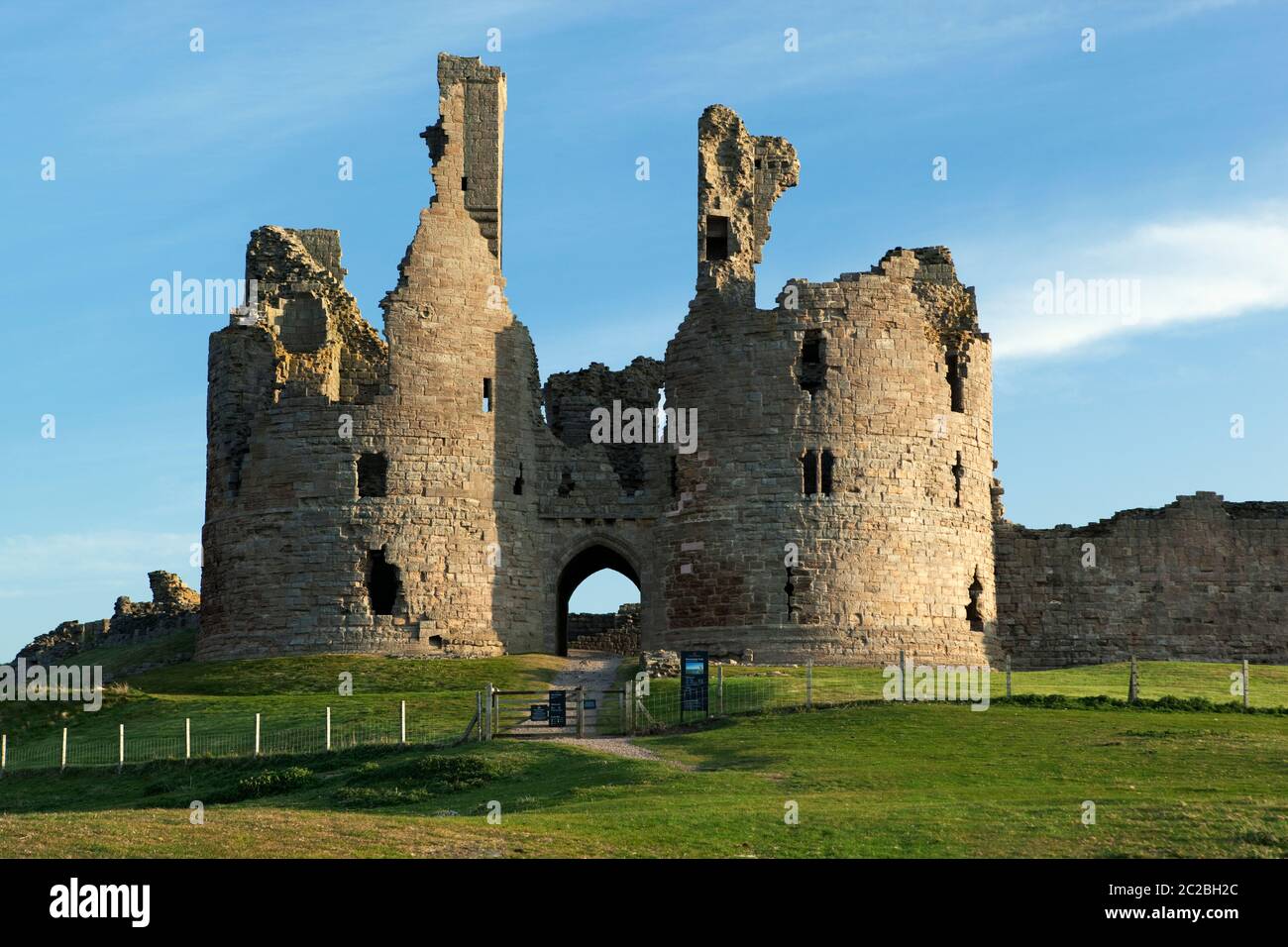 Ruins of medieval Dunstanburgh Castle, Alnwick, Northumberland, England, United Kingdom, Europe Stock Photo