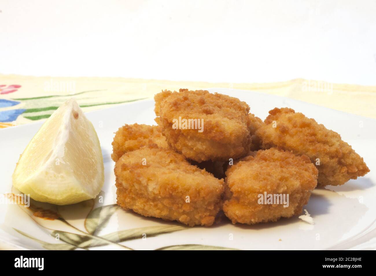 breaded chicken nuggets with packaging Stock Photo
