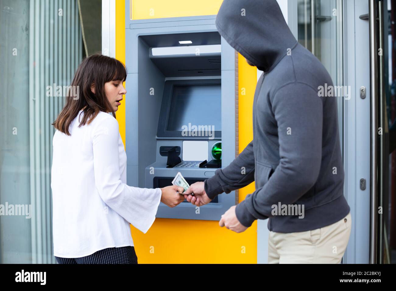 Woman stealing cash hires stock photography and images Alamy