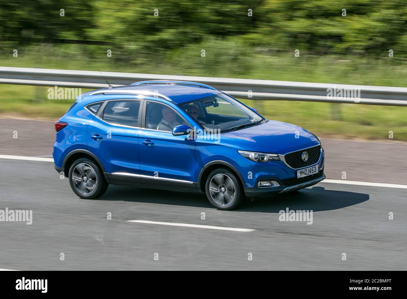 2018 blue MG ZS Exclusive Turbo Auto cars driving vehicle on UK roads, motors, motoring on the M6 motorway Stock Photo