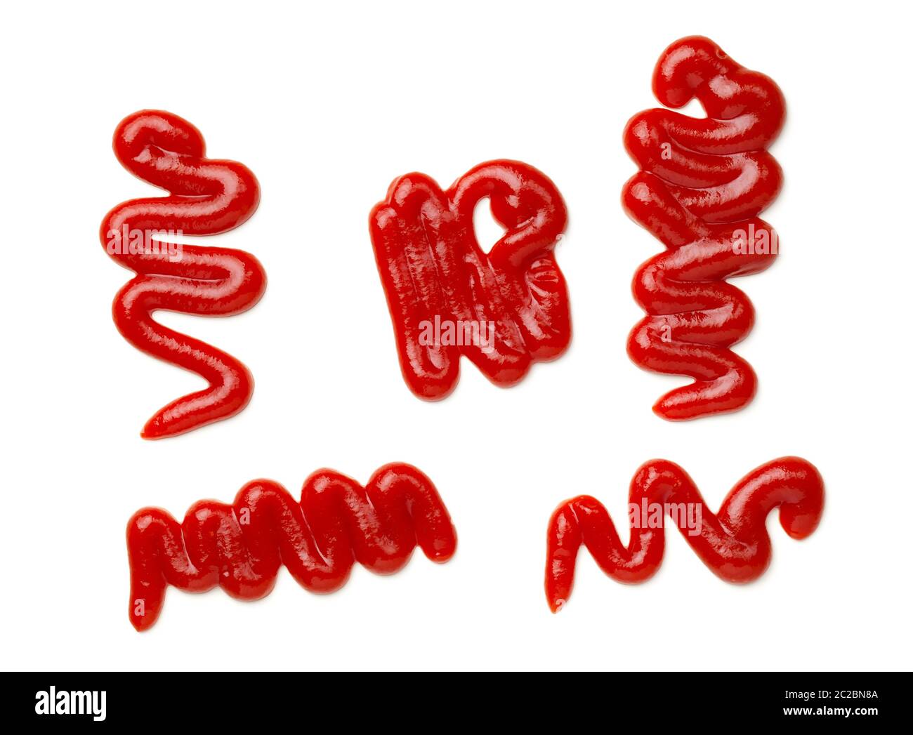 Ketchup splashes isolated on white background. Tomato sauce. Top view, flat lay Stock Photo