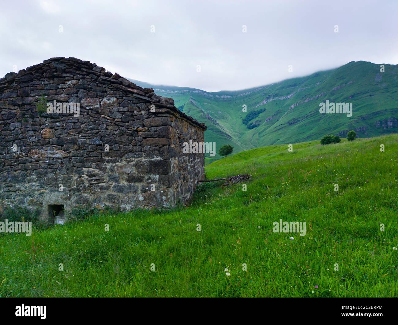 Spring landscape of pasiegas cabins and meadows in the Miera Valley in the Autonomous Community of Cantabria. Spain, Europe Stock Photo