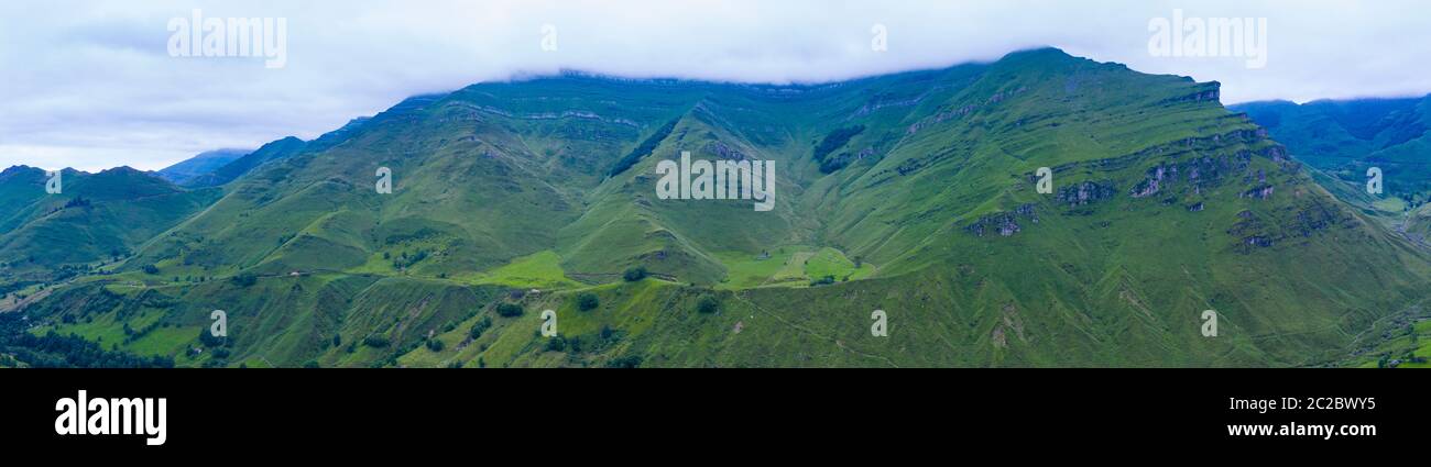 Aerial view with a drone of the spring landscape of pasiegas cabins and meadows in Miera Valley in Autonomous Community of Cantabria. Spain, Europe Stock Photo