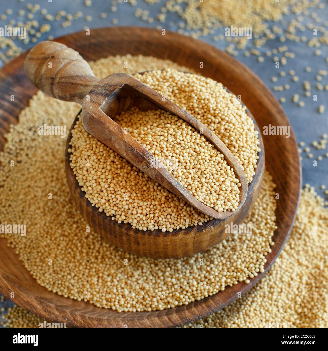 bowl of raw Amaranth Grain with a scoop close up Stock Photo