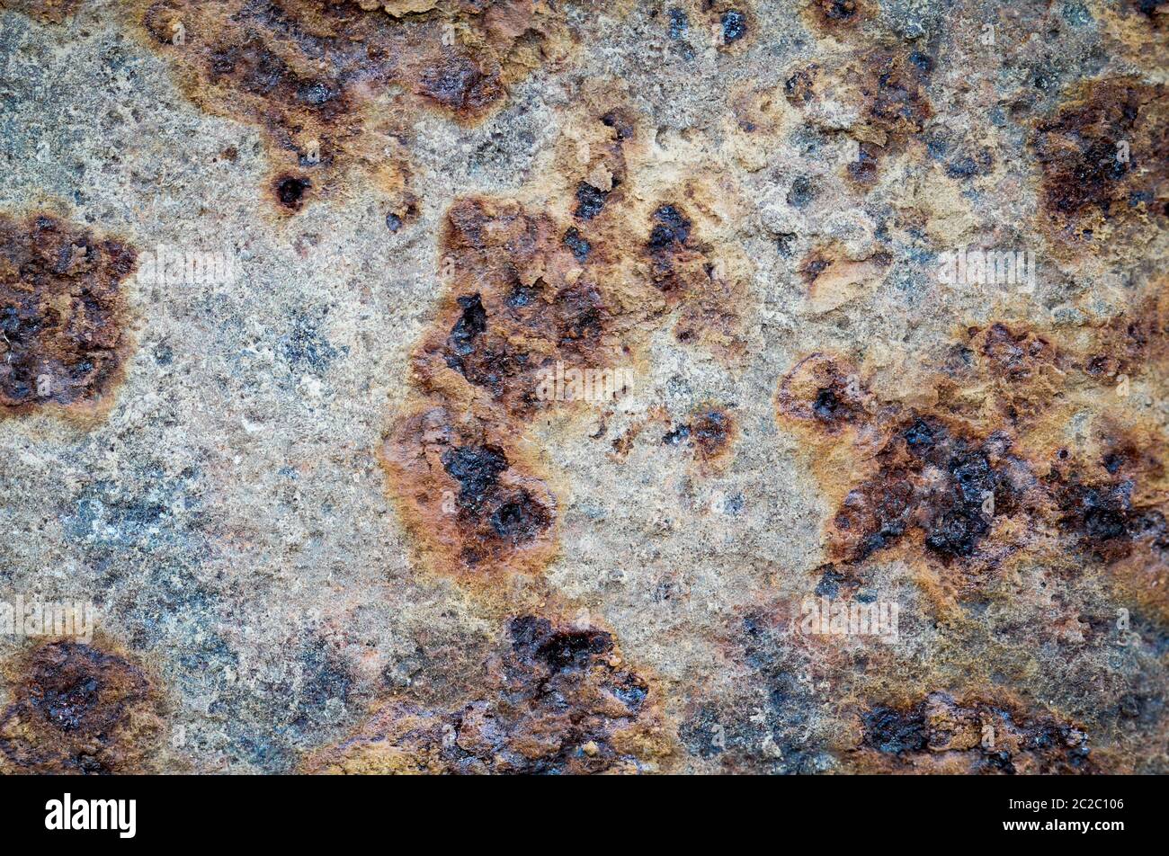 Rusty metal texture with paint residues and rust spots Stock Photo
