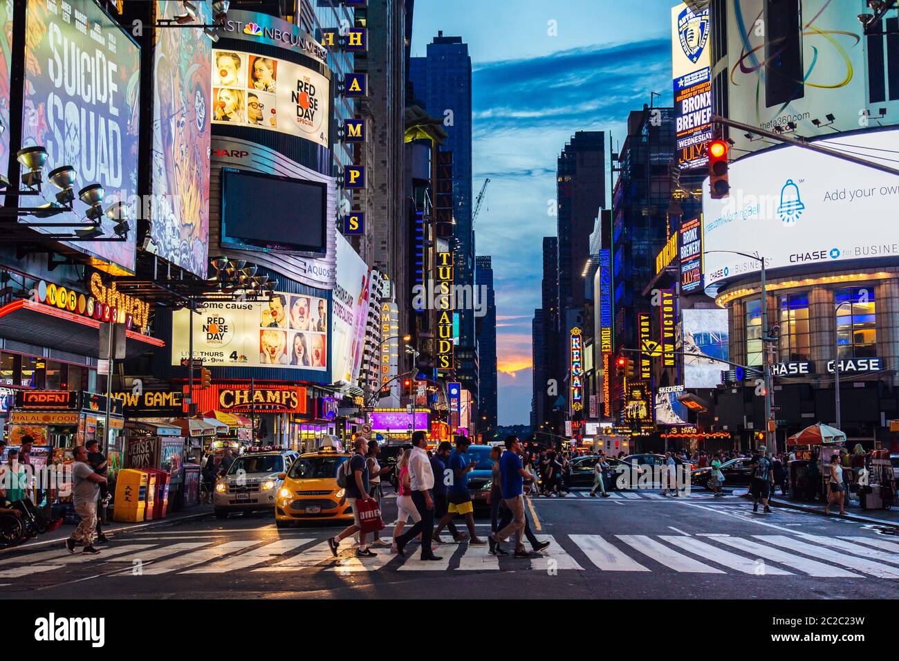 July 2016 people are crossing the street Times Square during sunset, Manhattan, New York United State Stock Photo