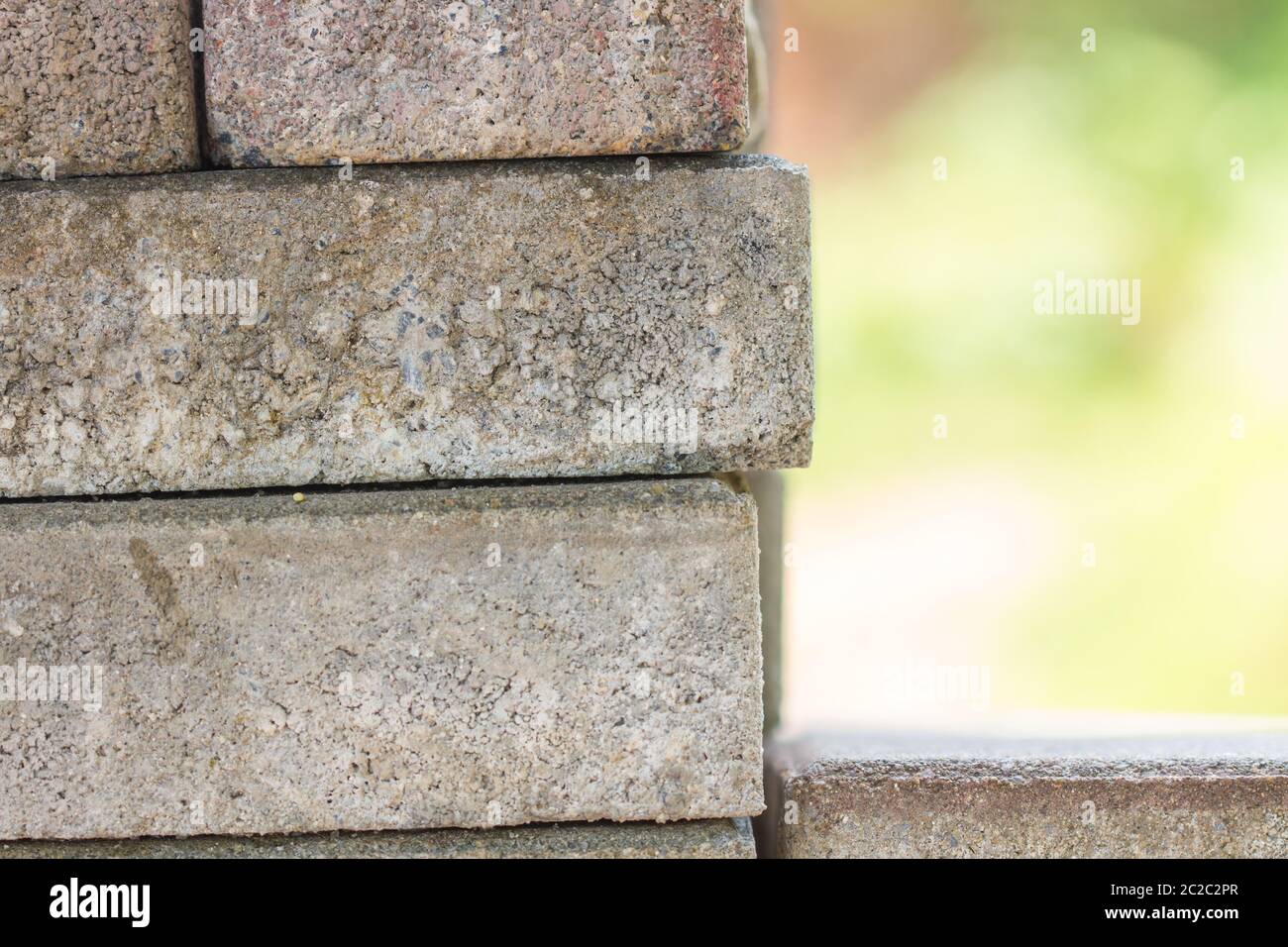 Bricklaying - pile of bricks, Stack of paving stone. Ready for construction Stock Photo