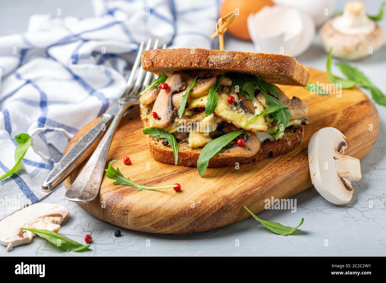 Sandwich with mushroom and scrambled eggs for Breakfast. Stock Photo