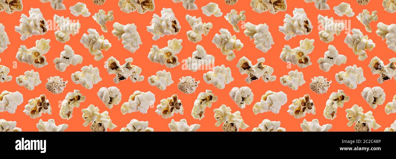 Popcorn seamless pattern. Popcorn on orange background Stock Photo