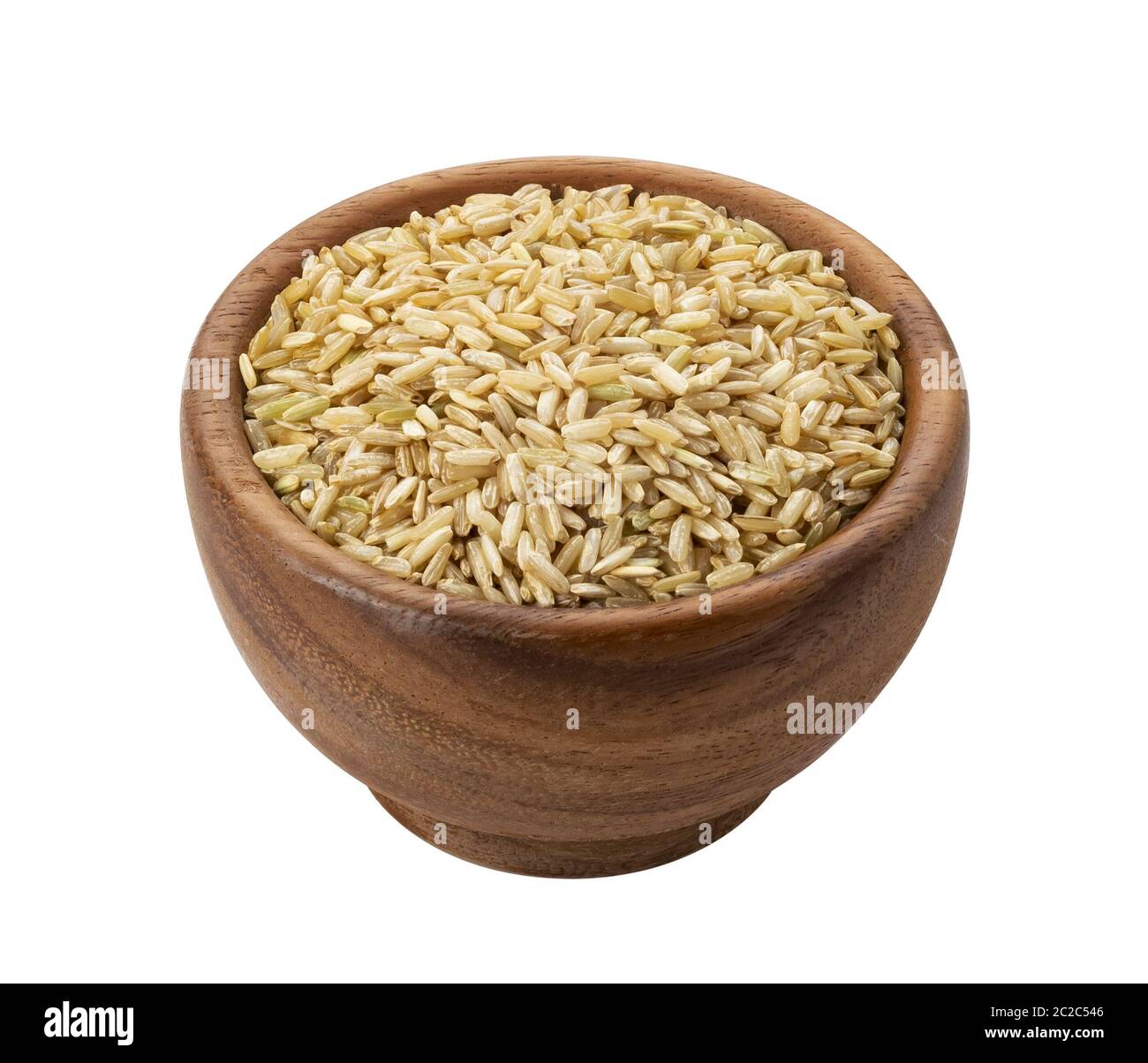 Brown rice groats in wooden bowl isolated on white background Stock Photo