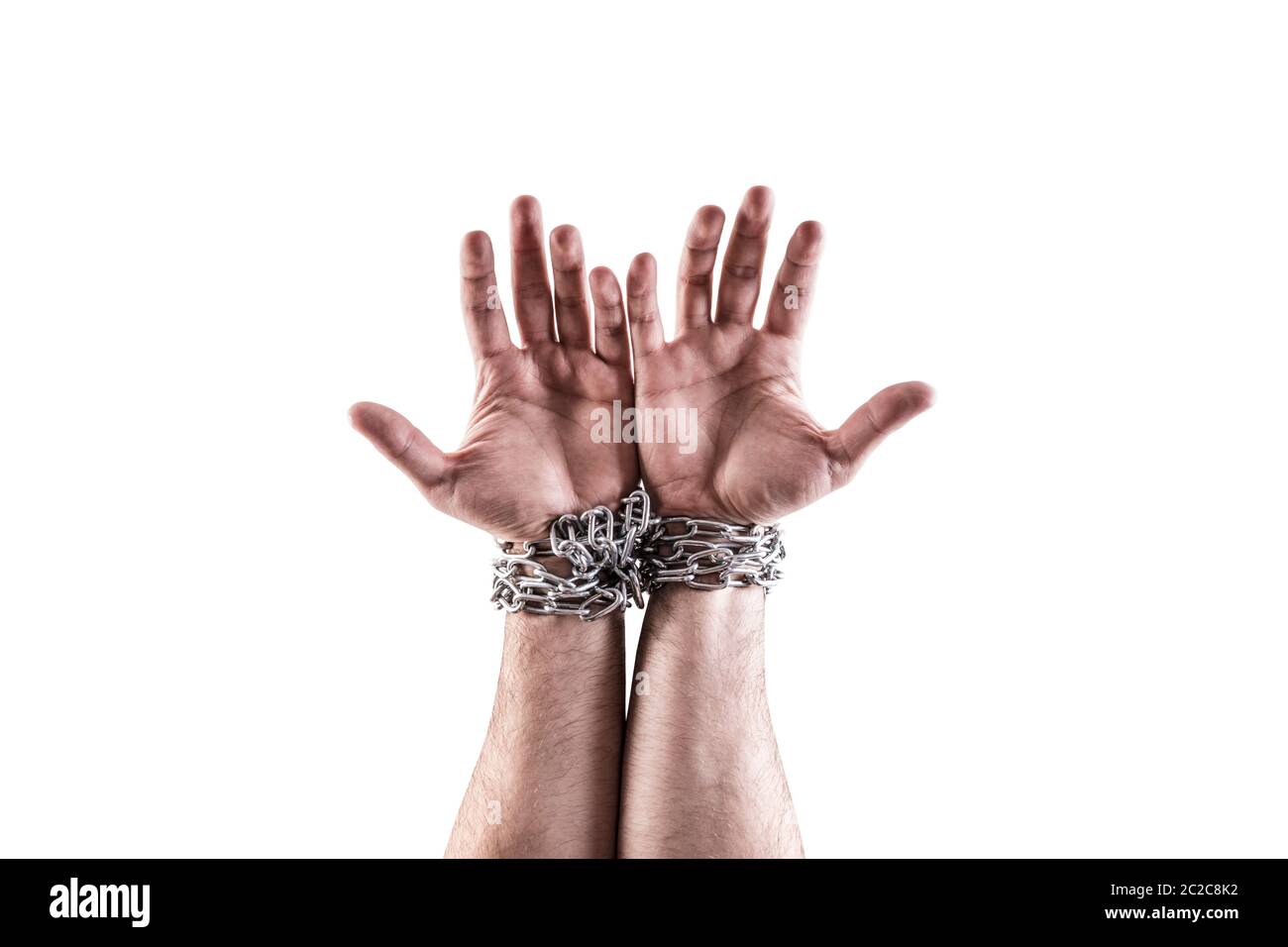 Two hands in chains isolated on white background with clipping path Stock Photo