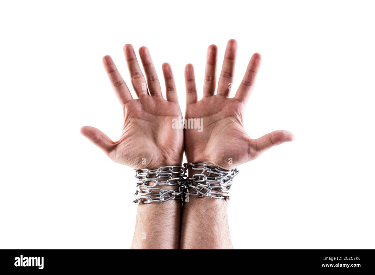 Two hands in chains isolated on white background with clipping path Stock Photo