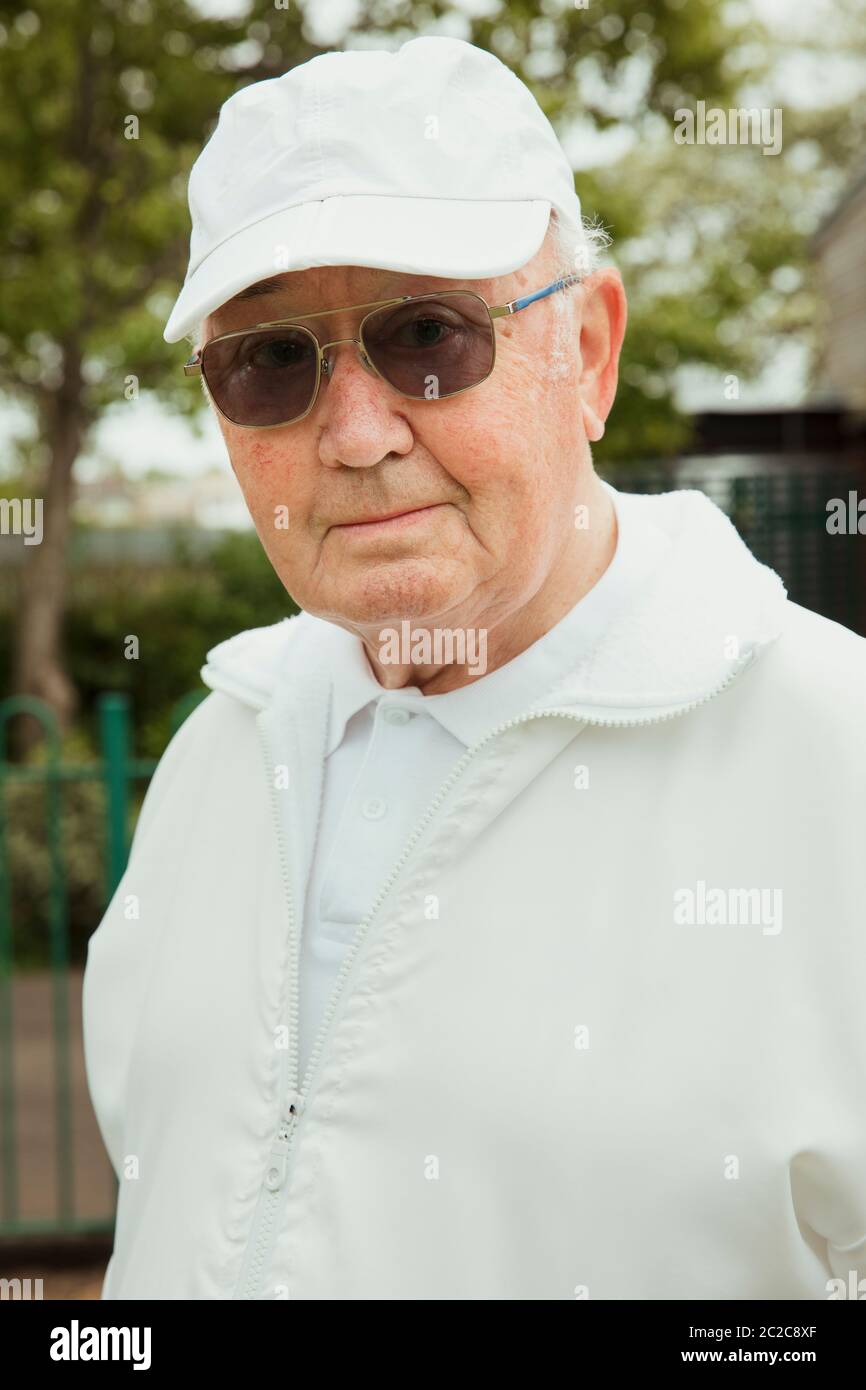 Senior wearing sunglasses cap hi-res stock photography and images - Alamy
