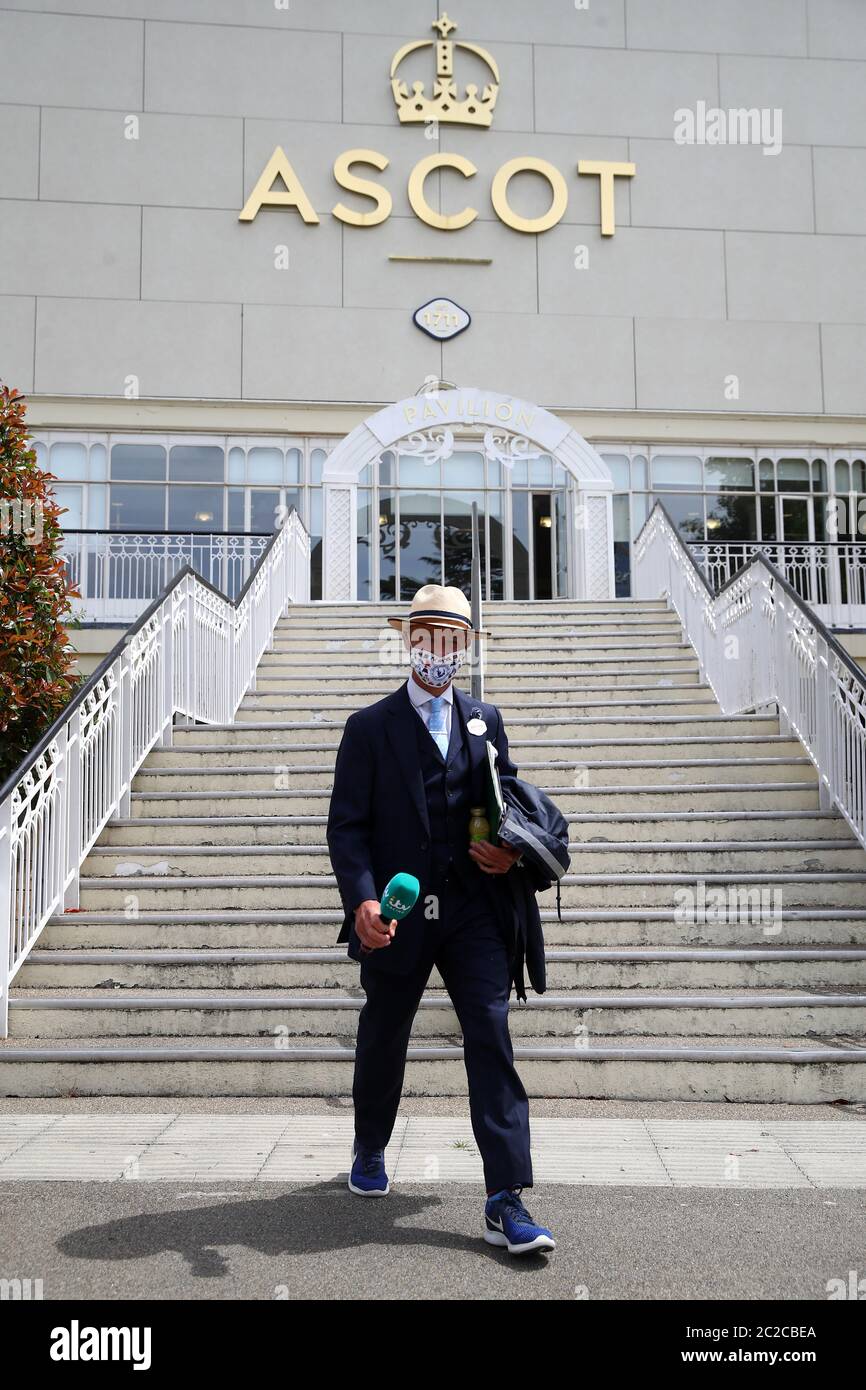 ITV Racing pundit Luke Harvey makes his way to the course during day ...